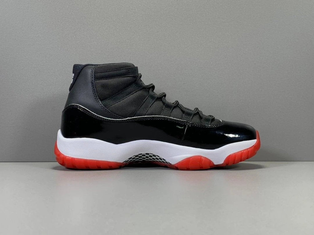 Air Jordan 11 Retro Playoffs Bred (2019) by Air Jordan