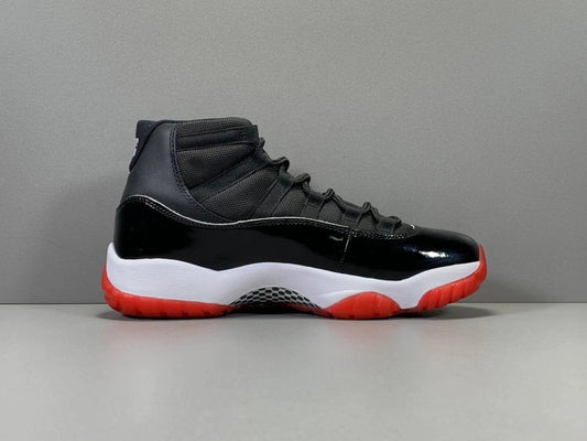Air Jordan 11 Retro Playoffs Bred (2019) by Air Jordan