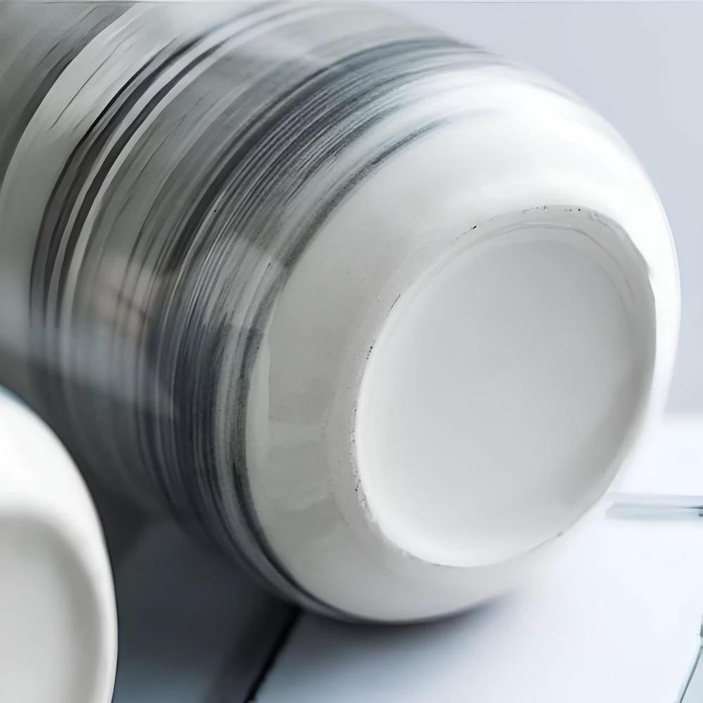 Marble Ceramic Soap Dispenser by Casa & Beyond