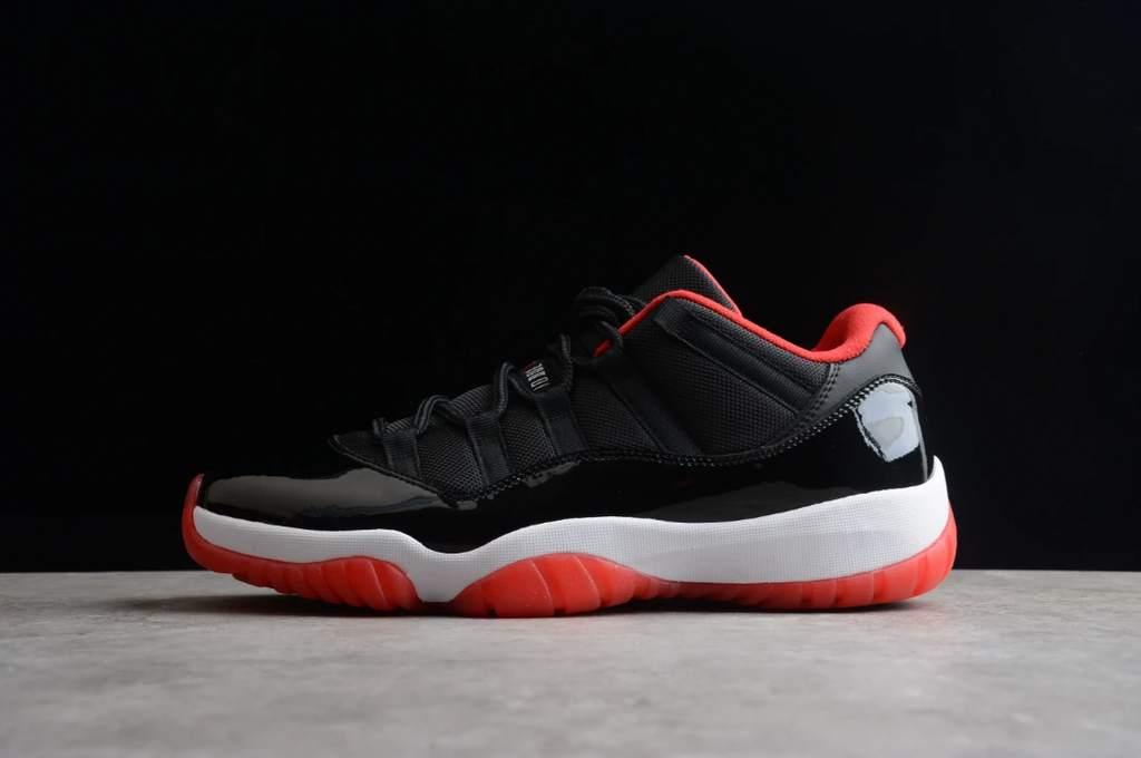 Air Jordan 11 Low “Legend Black Red” by Air Jordan