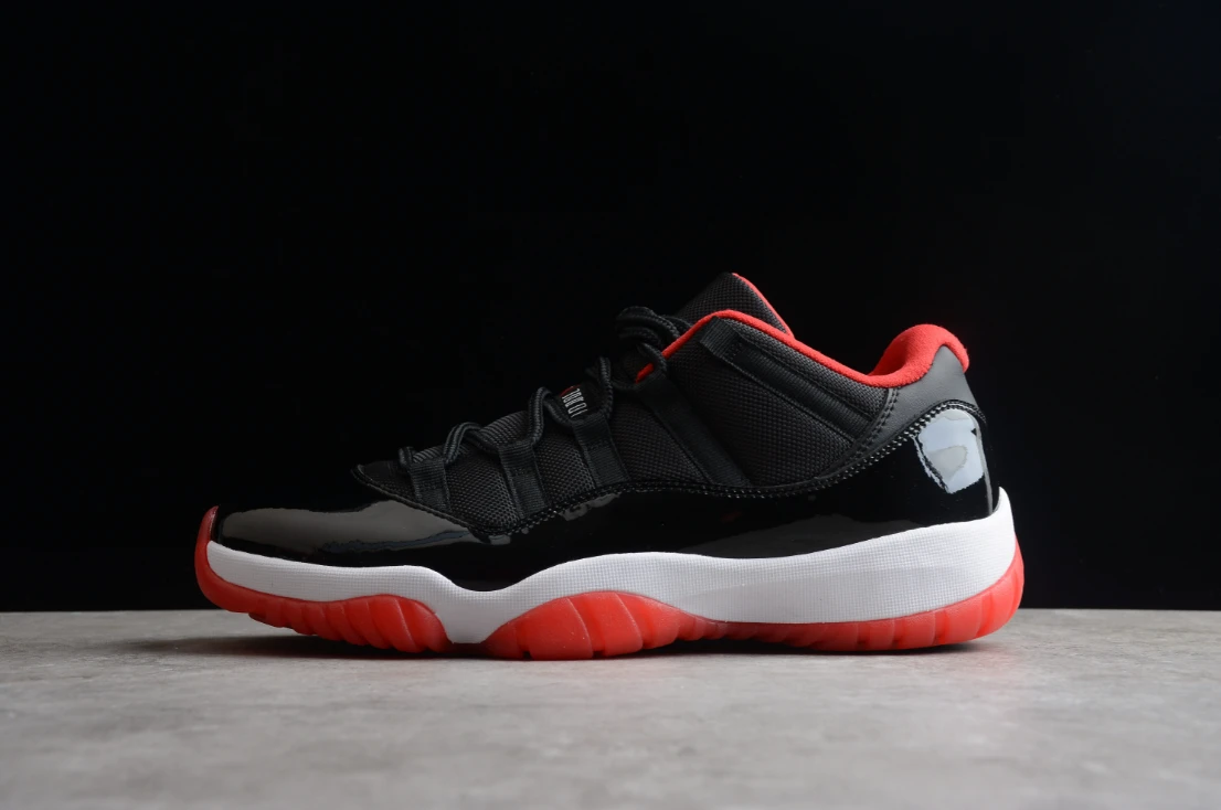 Air Jordan 11 Low “Legend Black Red” by Air Jordan