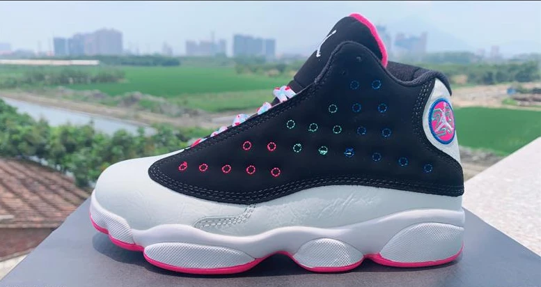 Air Jordan 13 GS Black And White Pastel Egg by Air Jordan