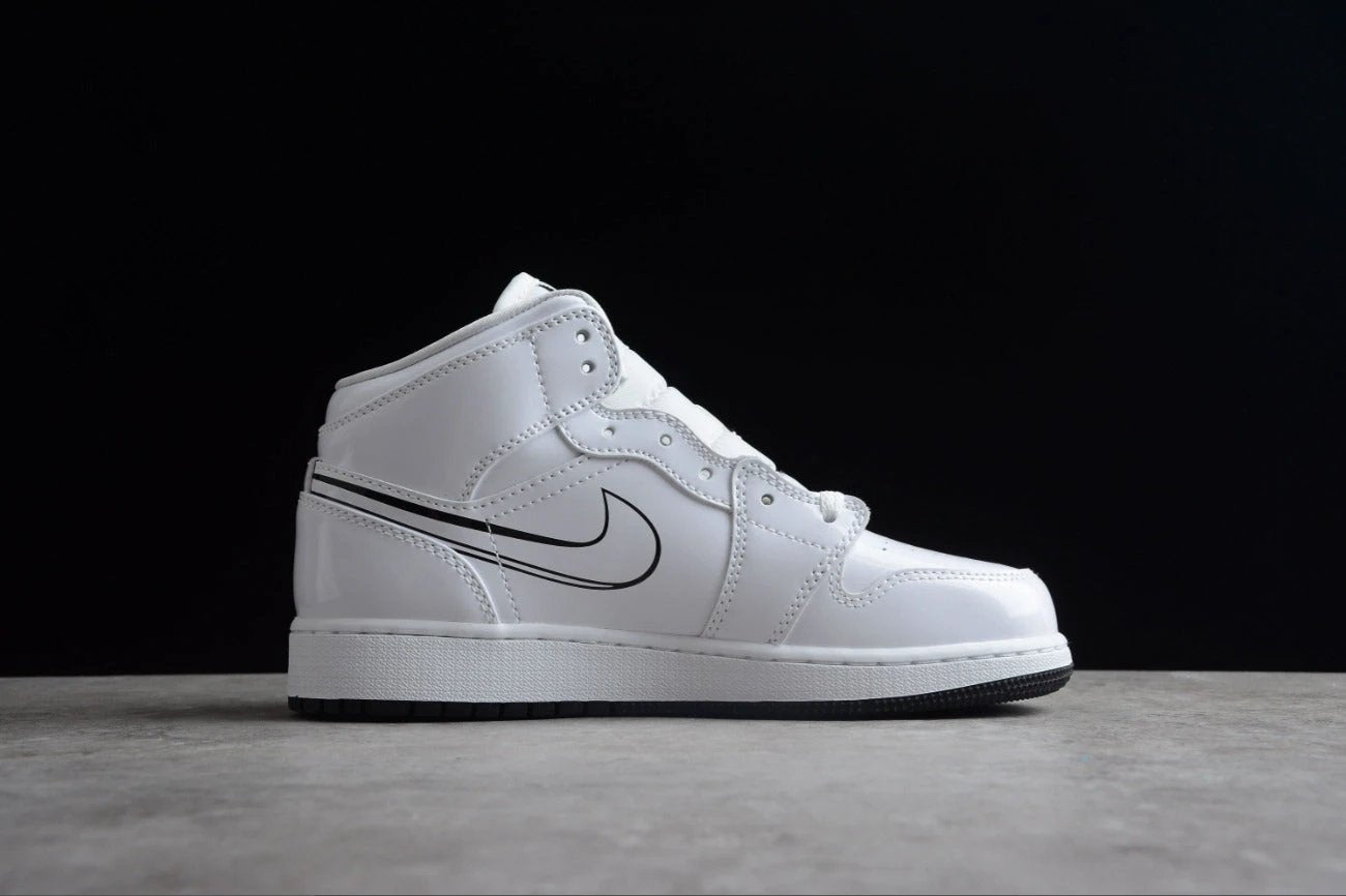 Air Jordan 1 Mid Big Kids by Air Jordan