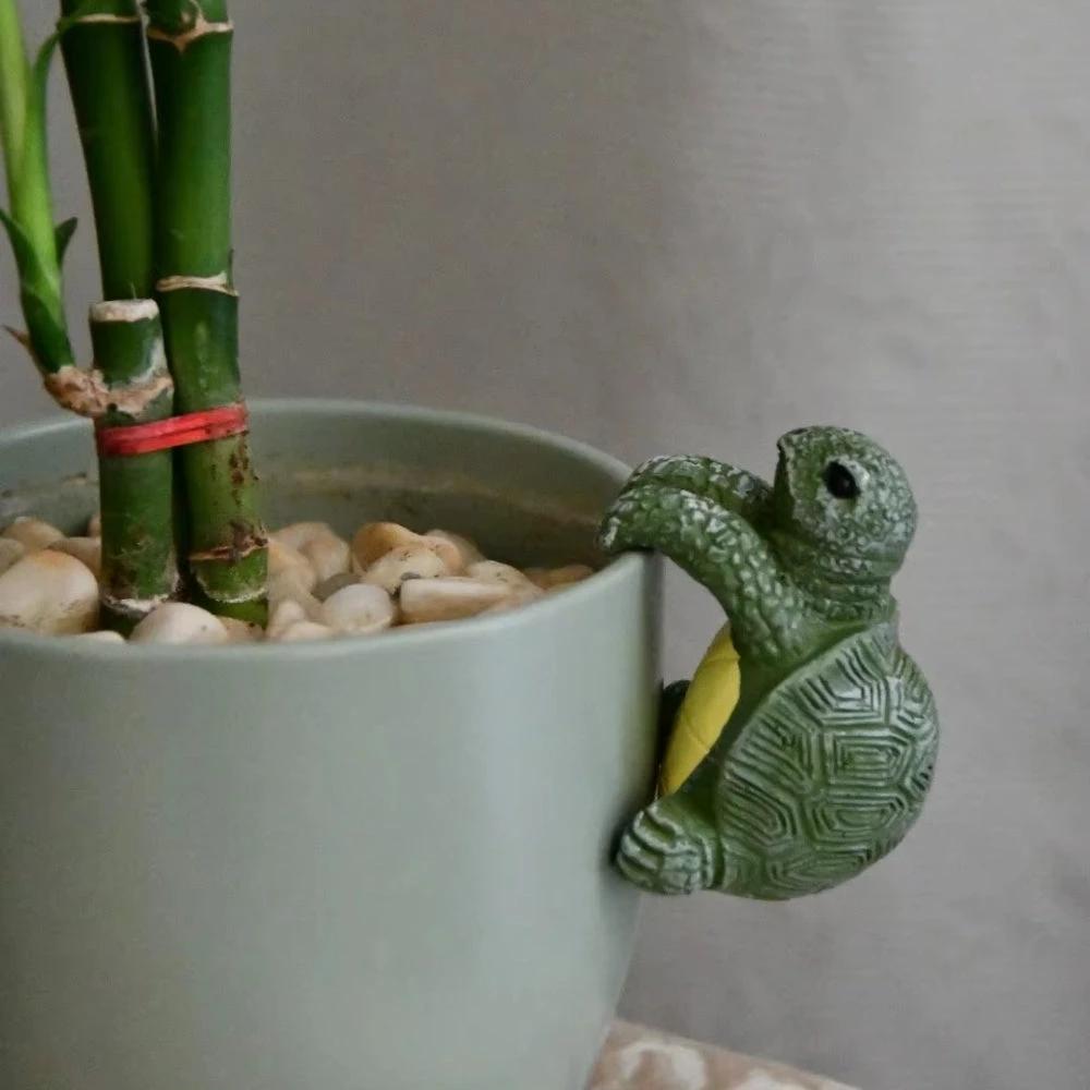 Arden Hanging Turtle Resin Pot Ornament by Casa & Beyond