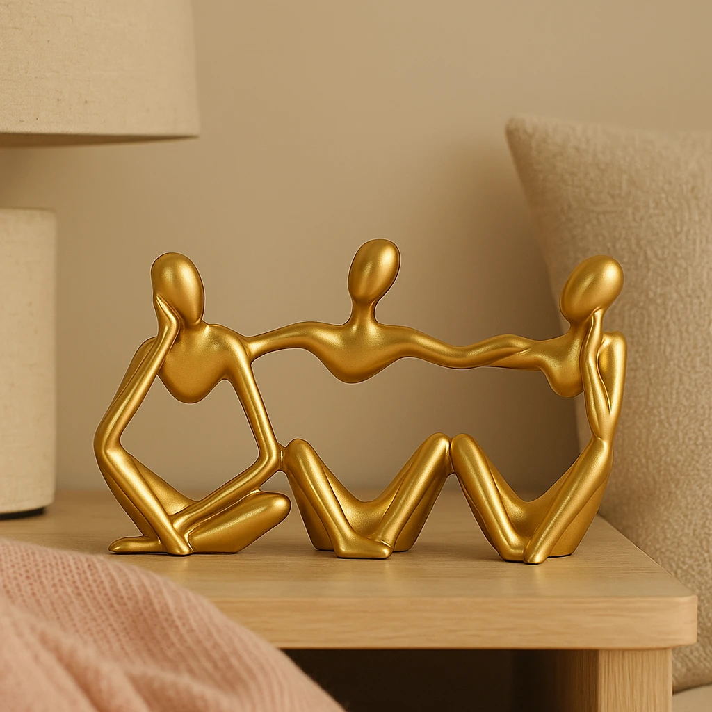 Golden abstract thinker statues in unique artistic positions Bowlift by Bowlift