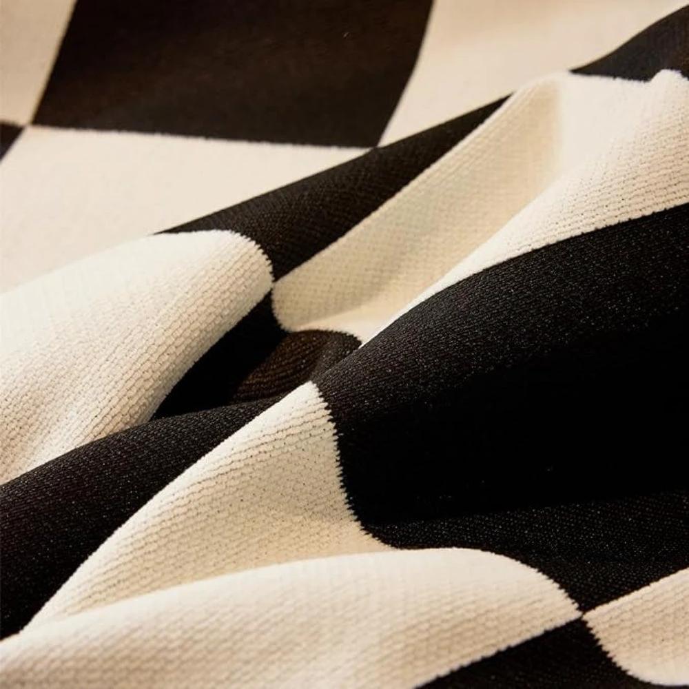 Chess Board Chic Tasseled Sofa Cover by Casa & Beyond