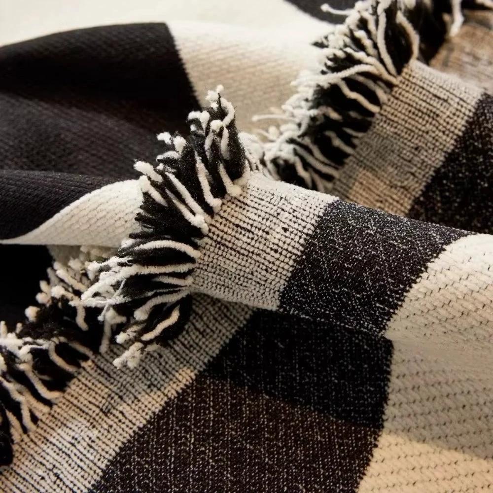 Chess Board Chic Tasseled Sofa Cover by Casa & Beyond