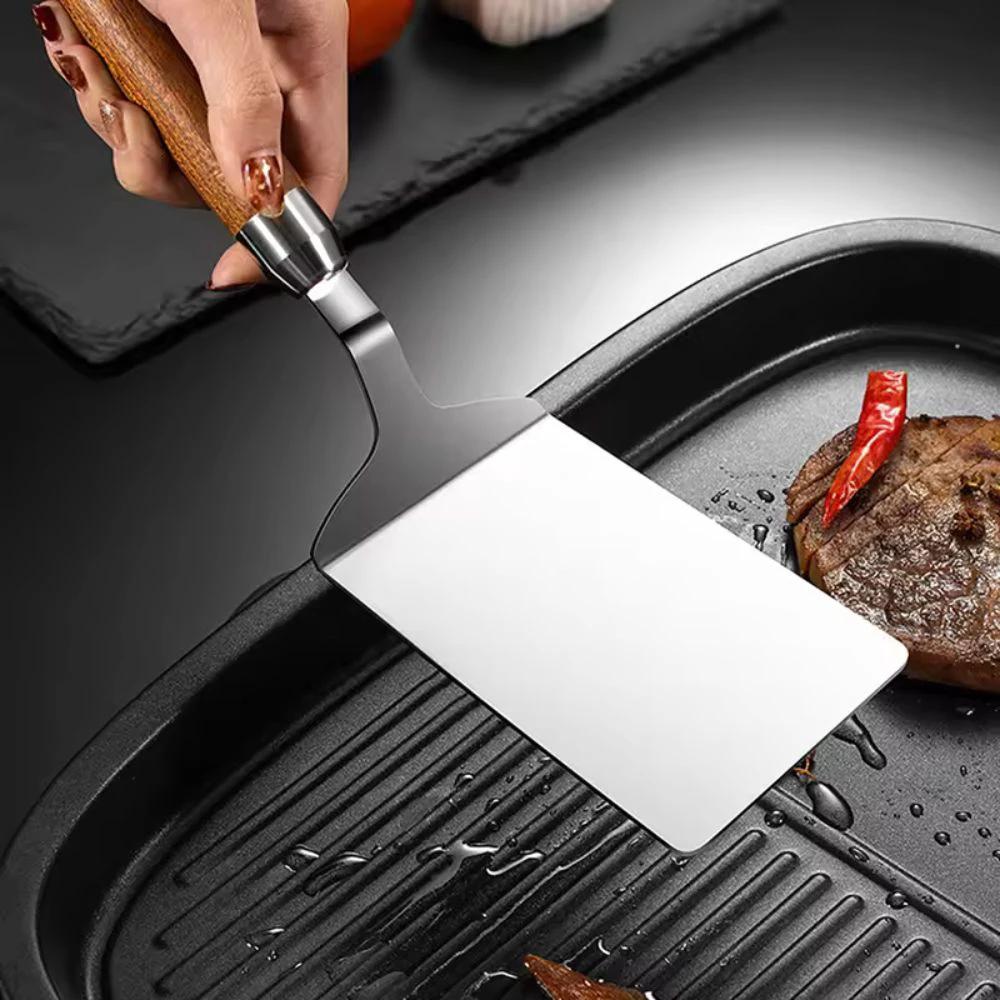 Stainless Steel Kitchen Spatula with Wooden Handle by Casa & Beyond