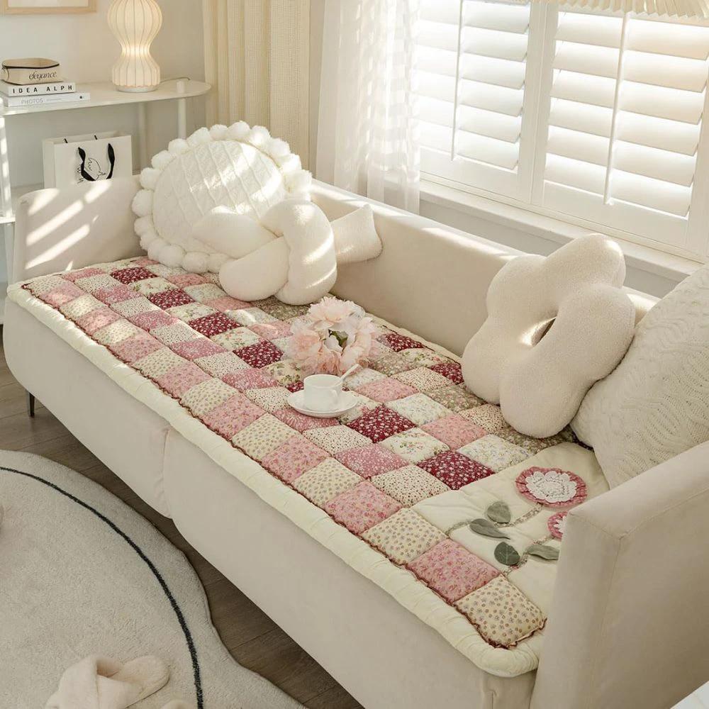 Floral Bloom Quilted Sofa Cover by Casa & Beyond.