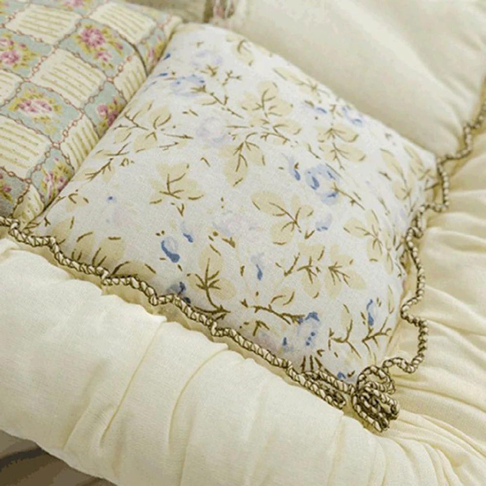 Floral Bloom Quilted Sofa Cover by Casa & Beyond.