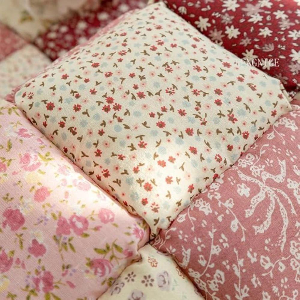 Floral Bloom Quilted Sofa Cover by Casa & Beyond.