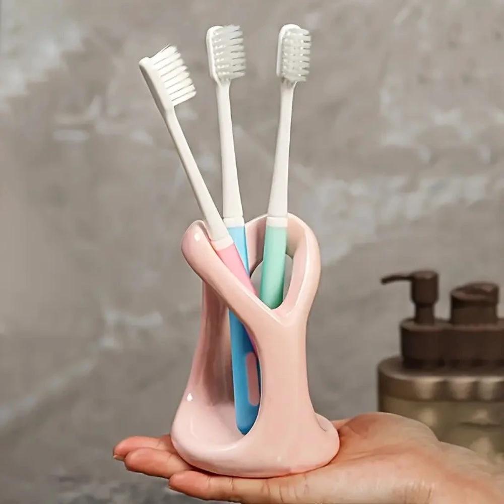 Heart-Shaped Ceramic Toothbrush Holder by Casa & Beyond