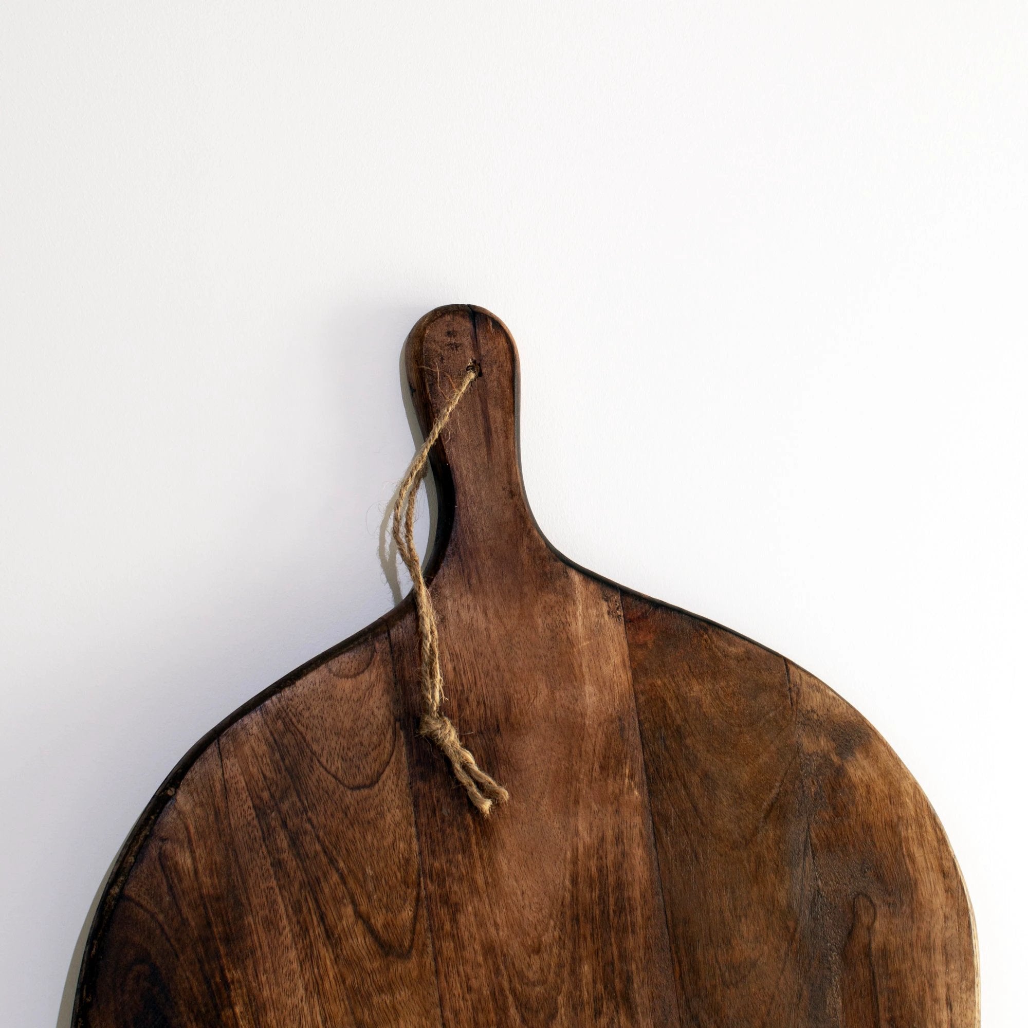 Irregular Round Dark Brown Chopping Boards by BowLift