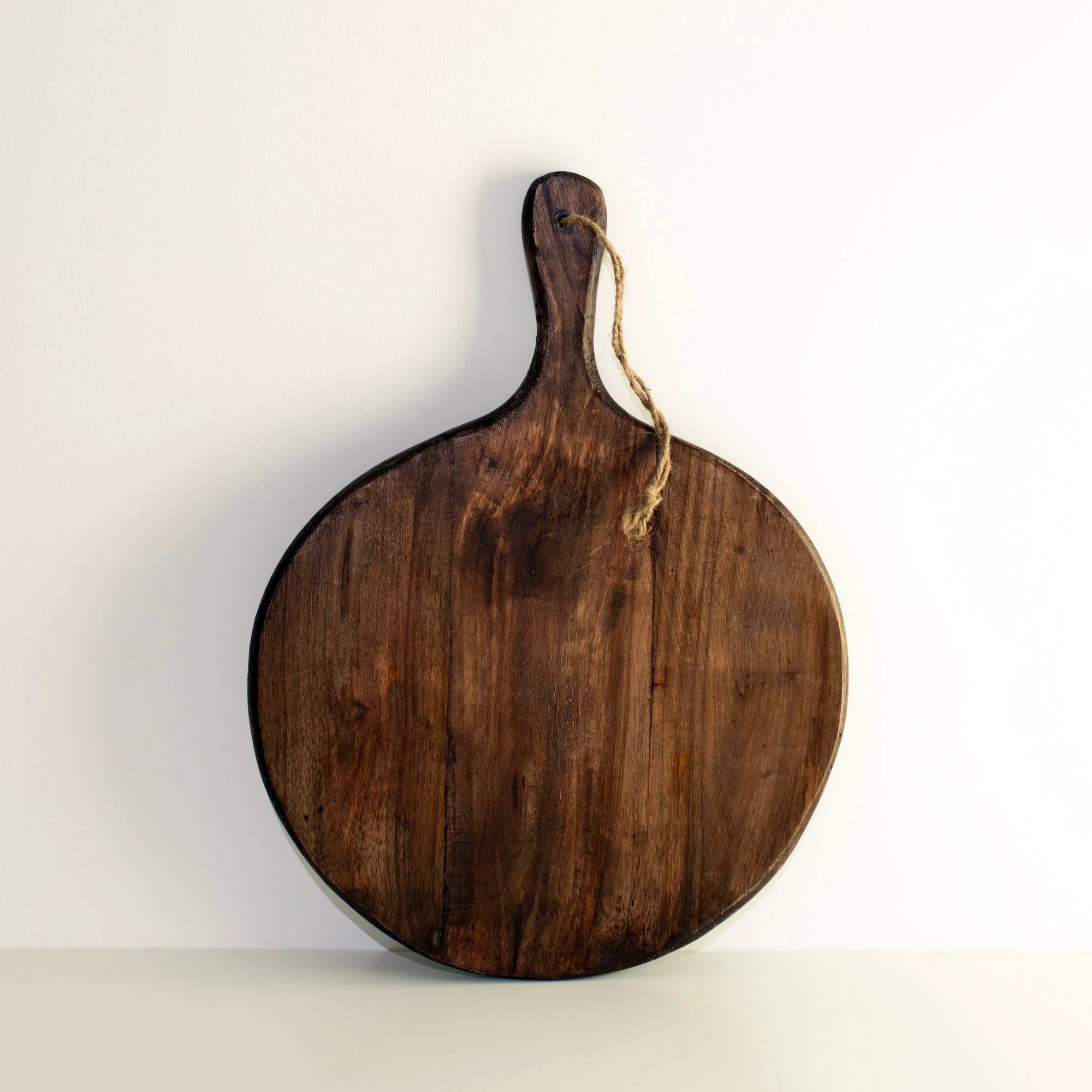 Irregular Round Dark Brown Chopping Boards by BowLift