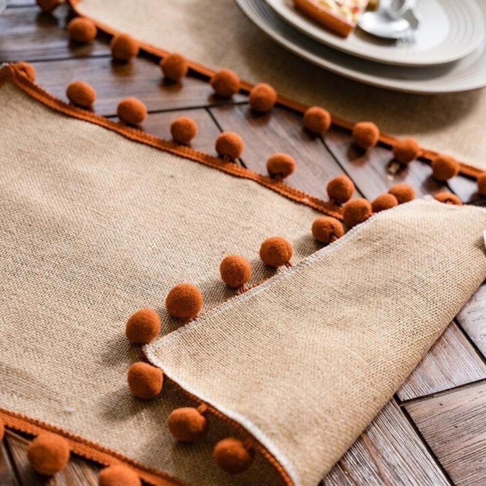 Jute Bohemian Pom-Pom Table Runner by Casa & Beyond