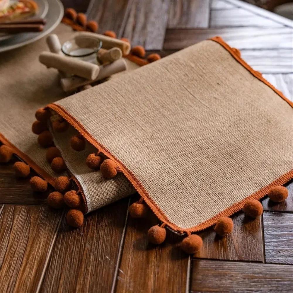 Jute Bohemian Pom-Pom Table Runner by Casa & Beyond
