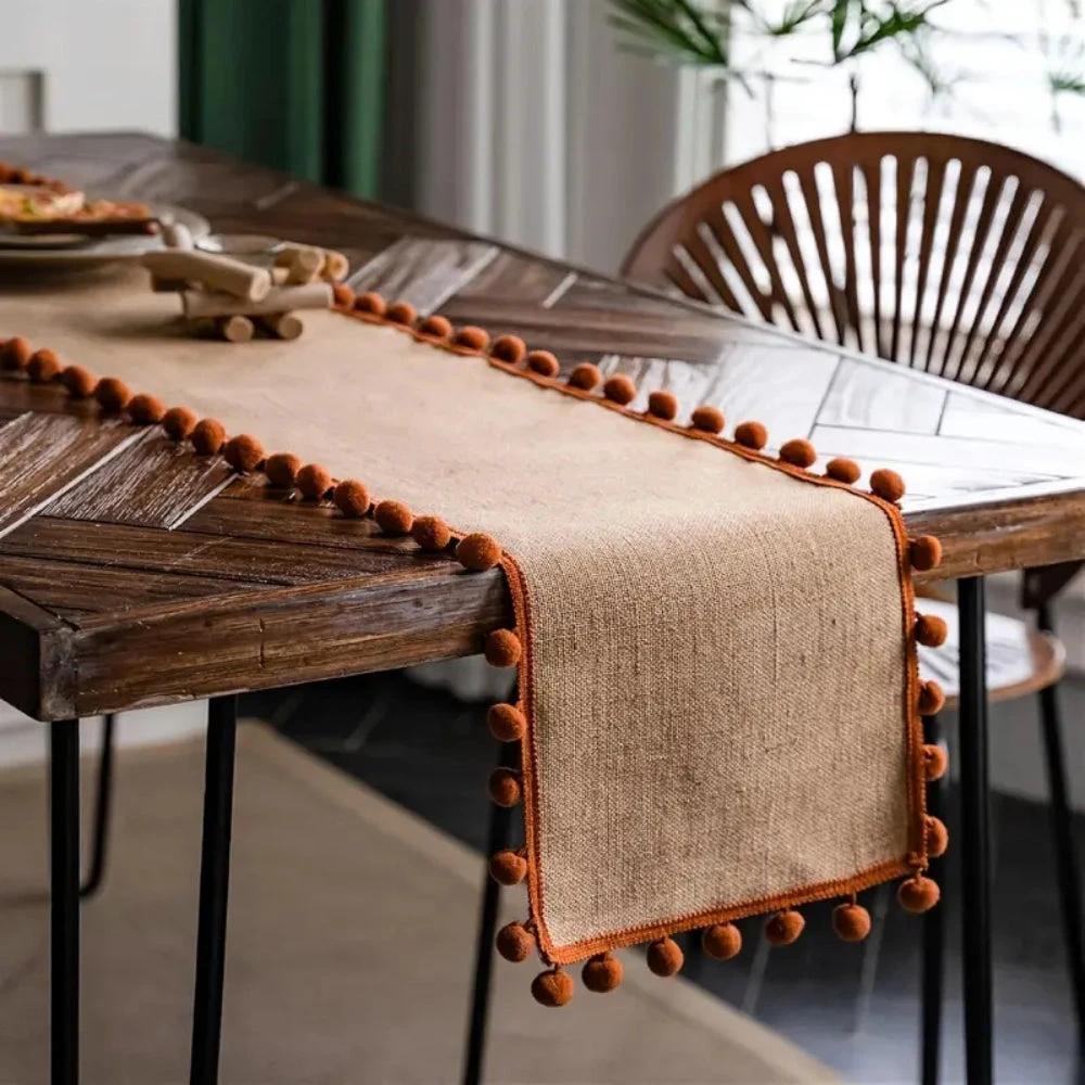 Jute Bohemian Pom-Pom Table Runner by Casa & Beyond