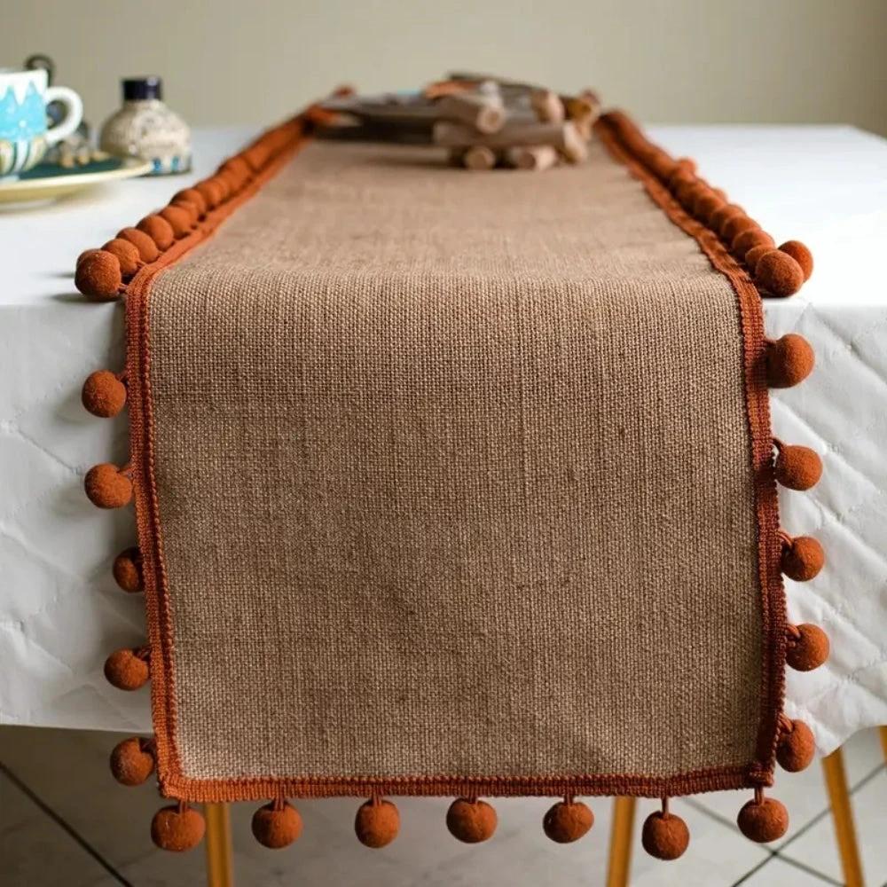Jute Bohemian Pom-Pom Table Runner by Casa & Beyond