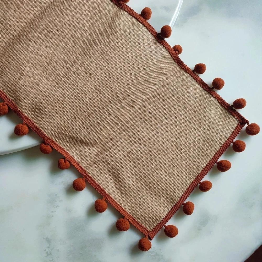 Jute Bohemian Pom-Pom Table Runner by Casa & Beyond