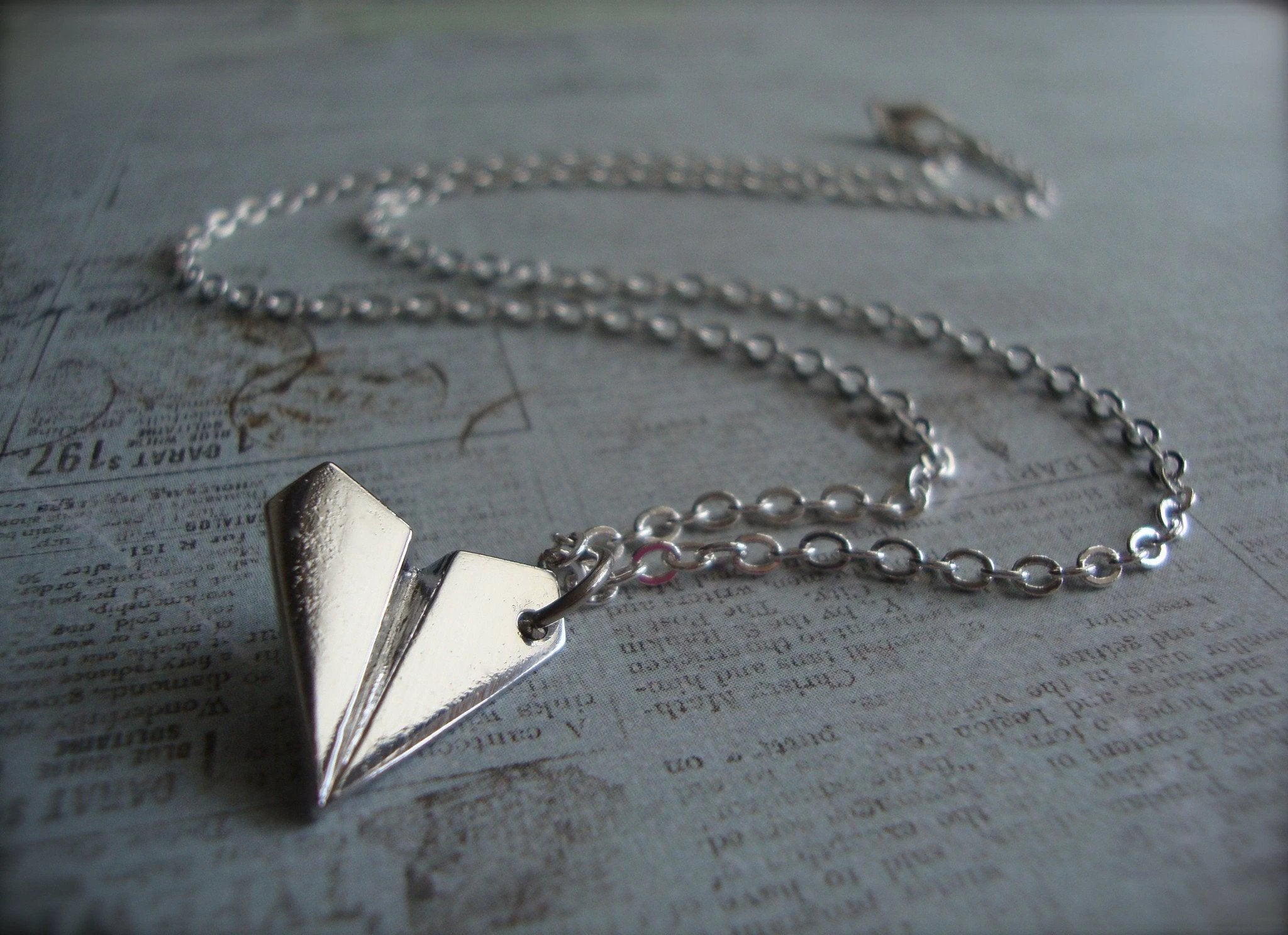 Paper Airplane Necklace by Bowlift