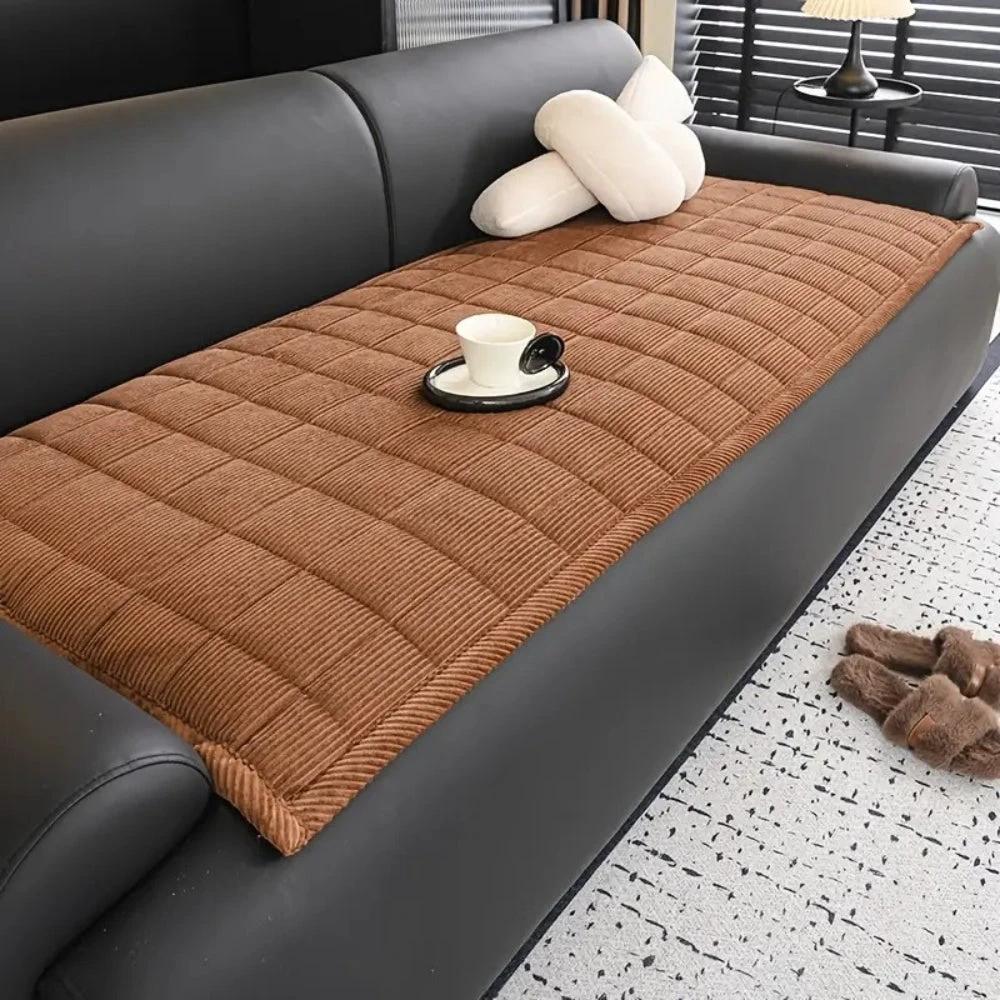 Metro Line Quilted Couch Cover Mat by Casa & Beyond.