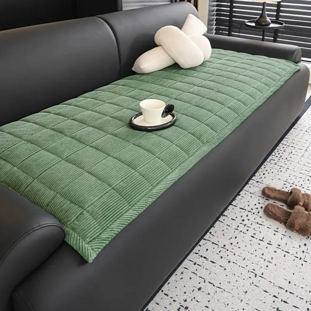 Metro Line Quilted Couch Cover Mat by Casa & Beyond.