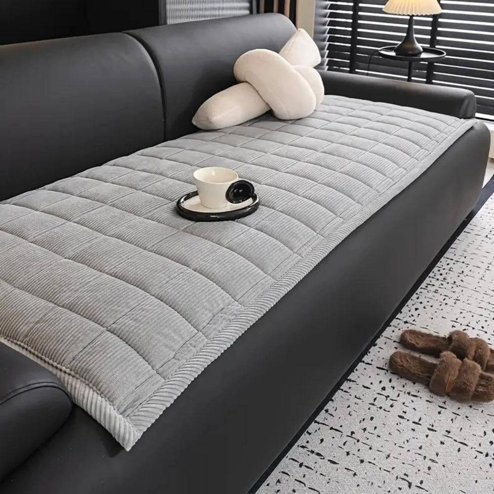 Metro Line Quilted Couch Cover Mat by Casa & Beyond.