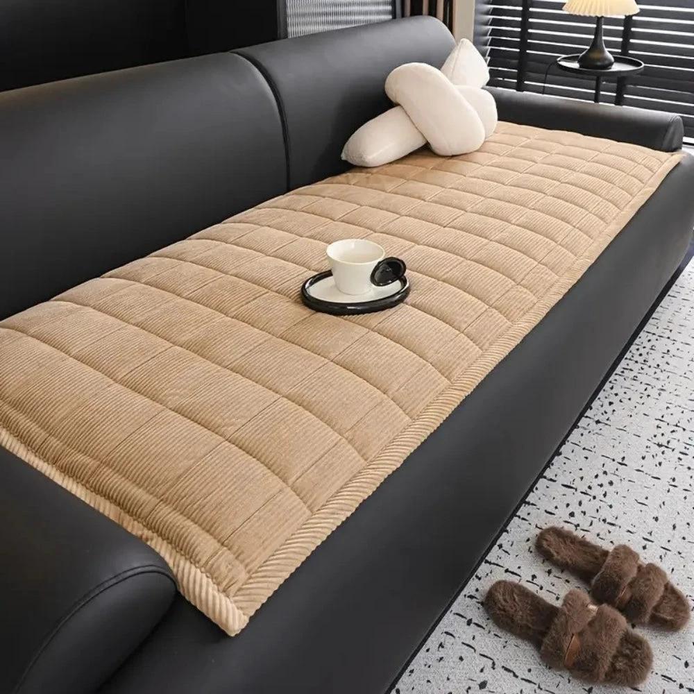 Metro Line Quilted Couch Cover Mat by Casa & Beyond.