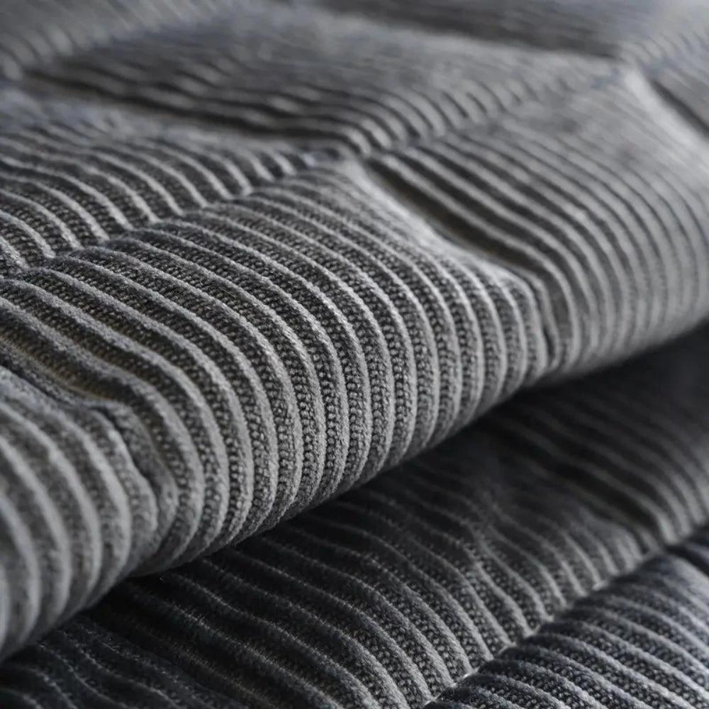 Metro Line Quilted Couch Cover Mat by Casa & Beyond.