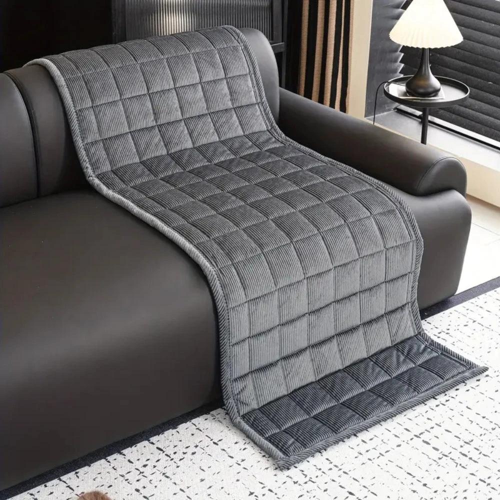 Metro Line Quilted Couch Cover Mat by Casa & Beyond.