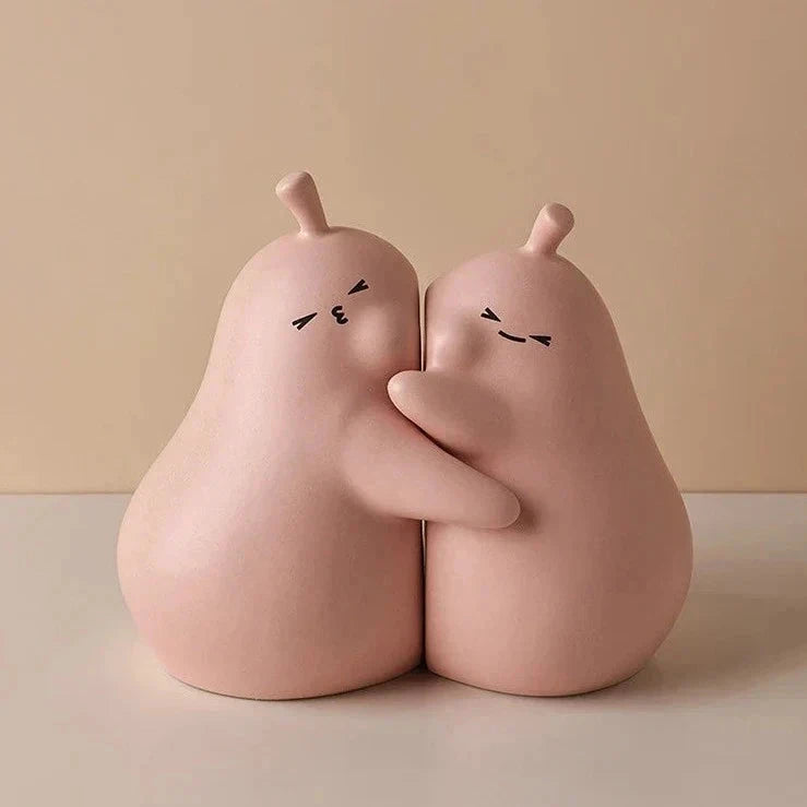 Hugging Pear Bookends by Bowlift