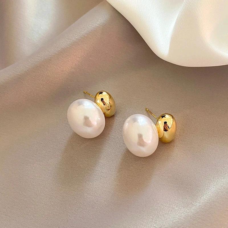 Classy Gold Accented Pearl Stud Earrings by BowLift