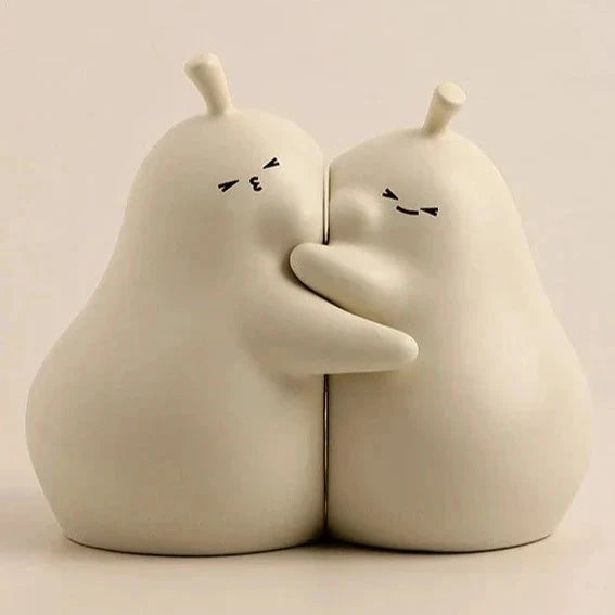 Hugging Pear Bookends by Bowlift