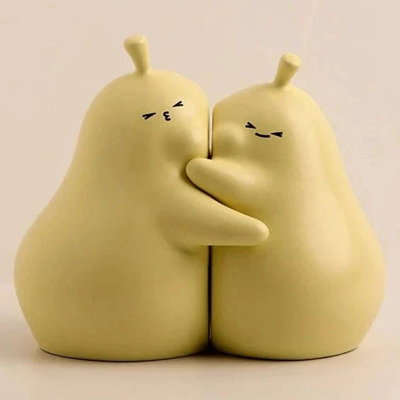 Hugging Pear Bookends by Bowlift