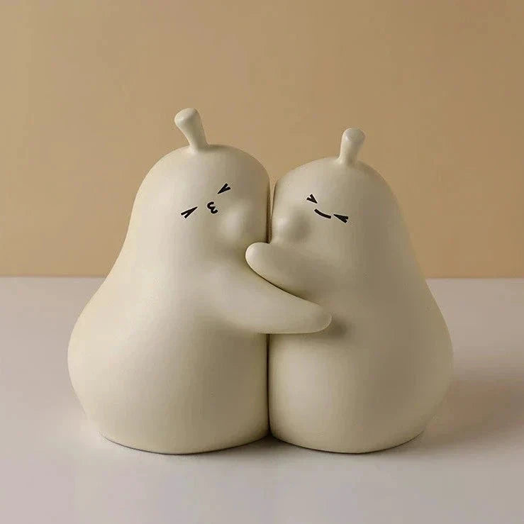 Hugging Pear Bookends by Bowlift
