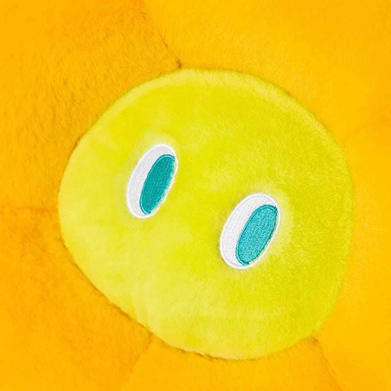 Fluffy Flower Cushion with Eyes by Bowlift