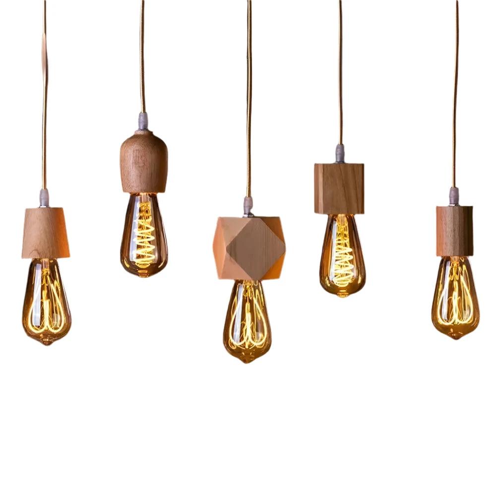 Handcrafted wooden pendant lamp with a naturally warm aura and timeless charm Bowlift by Bowlift