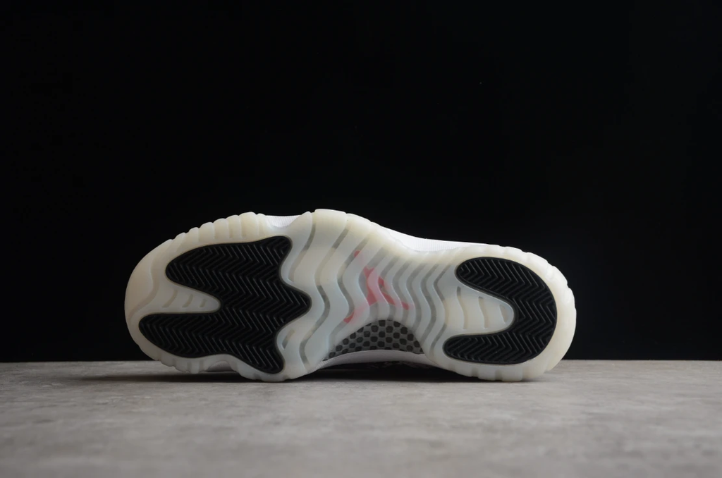 Air Jordan 11 Retro Low 'Light Bone Snakeskin' by Air Jordan