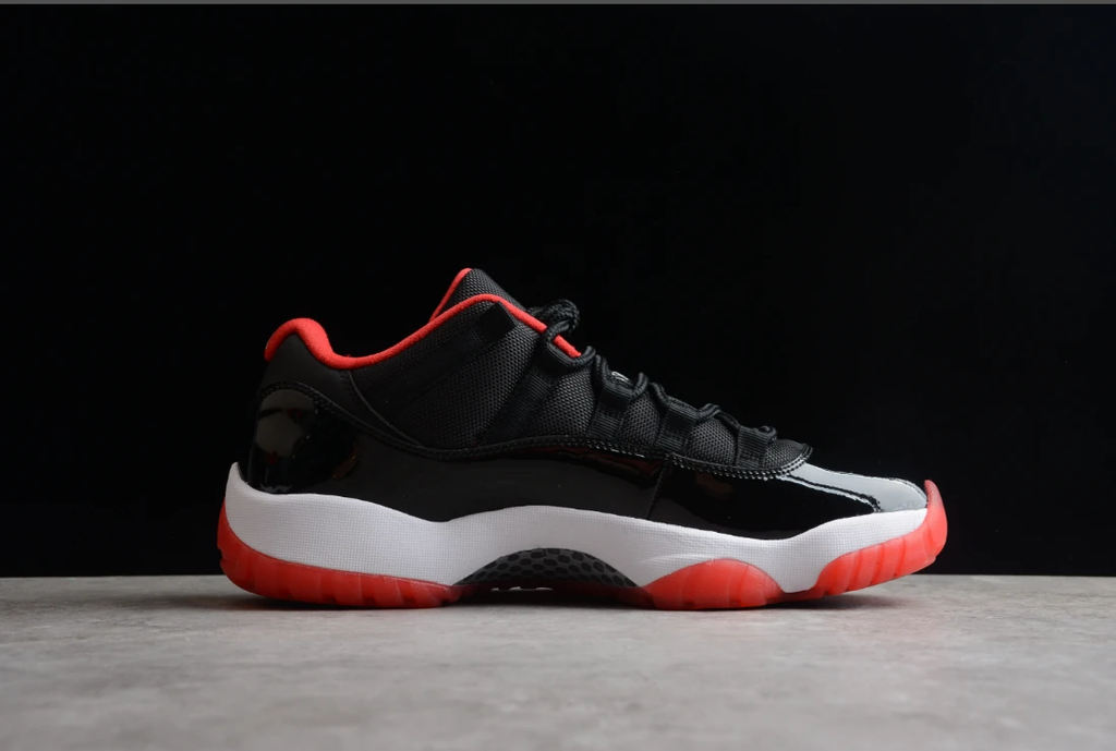 Air Jordan 11 Low “Legend Black Red” by Air Jordan
