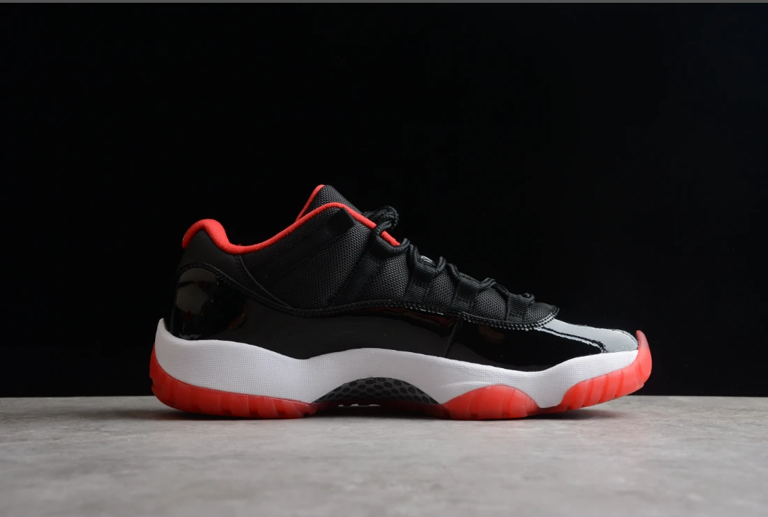 Air Jordan 11 Low “Legend Black Red” by Air Jordan