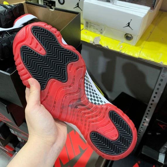 Air Jordan 11 Bred Black Red by Air Jordan