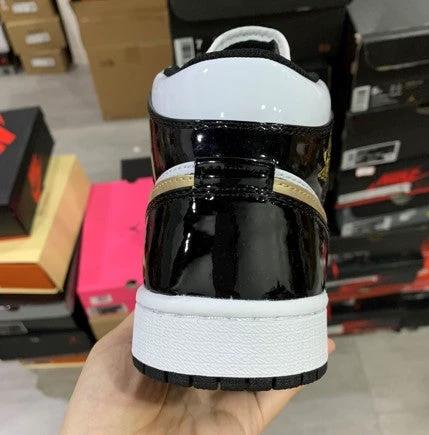 Air Jordan 1 Mid Black Gold by Air Jordan