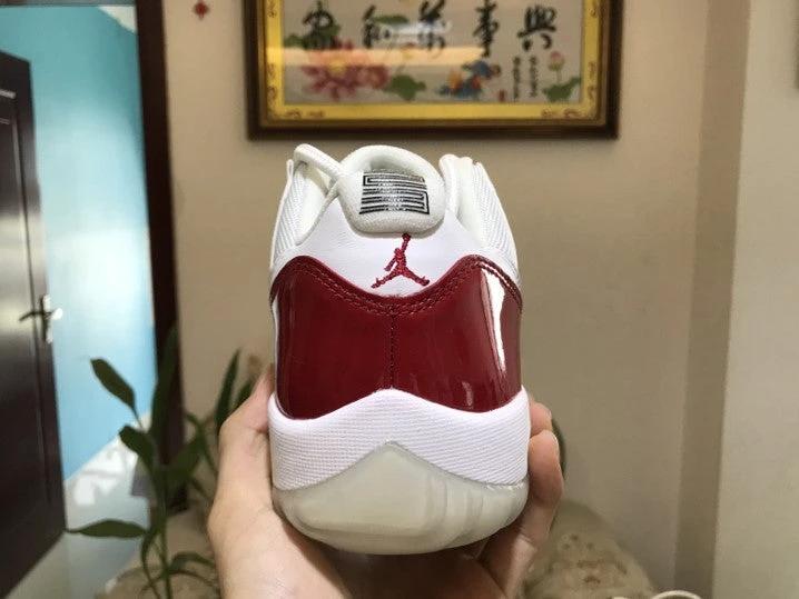 Air Jordan 11 Low “Varsity Red” by Air Jordan