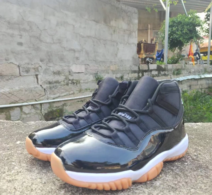 Air Jordan 11 Black Gum Sneakers by Air Jordan