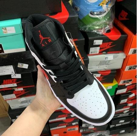 Air Jordan 1 Mid Black And White Red Reverse by Air Jordan
