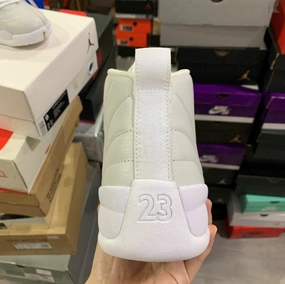 Air Jordan 12 White Platinum Owl x OVO by Air Jordan