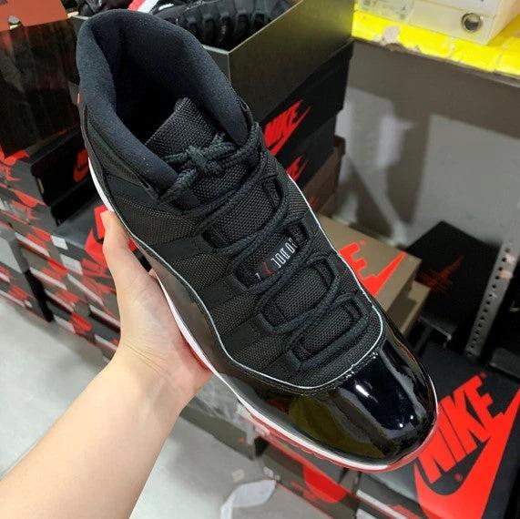 Air Jordan 11 Bred Black Red by Air Jordan