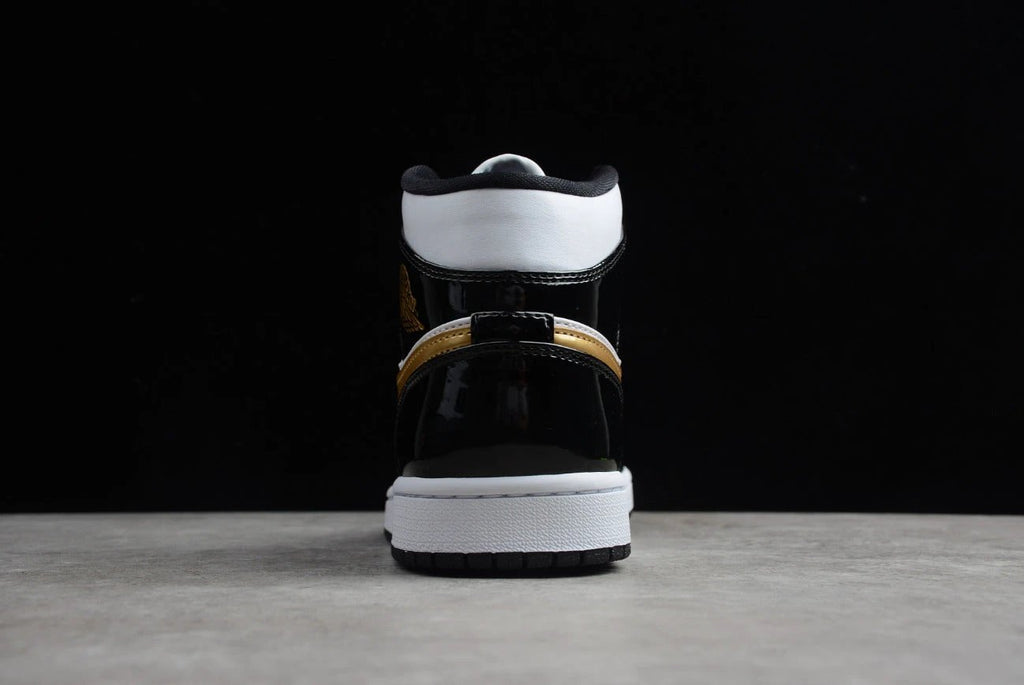 Air Jordan 1 Mid Black Gold Toe by Air Jordan