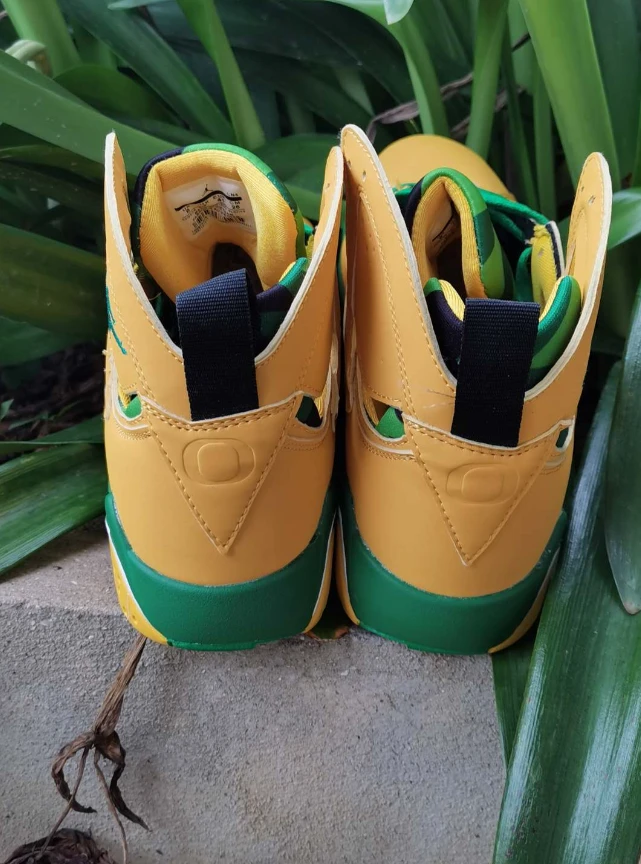 Air Jordan 7 Retro 'Oregon Ducks' Yellow Green by Air Jordan