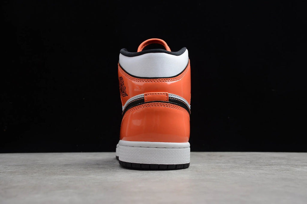 Air Jordan 1 Mid GS Orange Black by Air Jordan